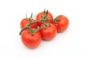 Five fresh tomatoes on isolated background Royalty Free Stock Photo