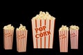 Five Full Popcorn Containers Isolated on Black