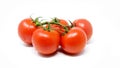 Five full red tomatoes on a white background