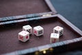 Five gambling dices on an old-fashioned background