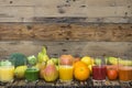 Five glasses with fruit and vegetable smoothies