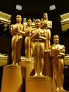 Five gold Oscar statues stand guard at The Academy Awards