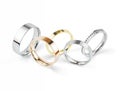 Five Gold Wedding Rings on White Background