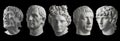 Five gypsum copy of ancient statue heads isolated on a black background. Plaster sculpture mans faces. Royalty Free Stock Photo