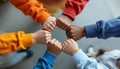 Five hands clasped together in unity and support Royalty Free Stock Photo