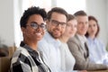 Happy multiracial team smiling looking at camera