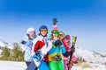 Five happy friends with snowboards and skis Royalty Free Stock Photo