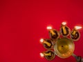 Five headed oil lamp burning with glowing flame. These are used in hindu rituals in bengal india