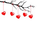 Five hearts hanging on a black branch on red threads