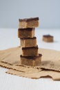 Stacked Pralines on Parchment Paper and Clean Background