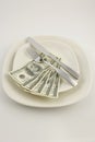 Five hundred dollar bills on a plate Royalty Free Stock Photo