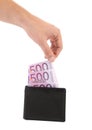 Five hundred euro in purse and hand. Royalty Free Stock Photo