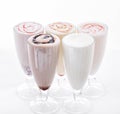 Five Ice Cream Shakes. Delicious ice cream float, vanilla, strawberry, coffee, chocolate and white background Royalty Free Stock Photo