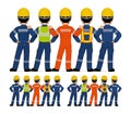 Five industrial workers standing together on white background