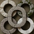 Five intertwined stone rings, each with Royalty Free Stock Photo