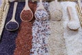 Five kinds of rice on wooden spoon