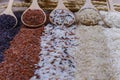 Five kinds of rice on wooden spoon