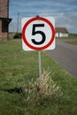 Five miles per hour sign