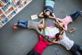 Happy children lying on floor Royalty Free Stock Photo