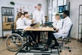 Five multiracial medical workers having conference meeting Royalty Free Stock Photo