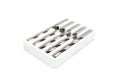 Five new drill bits in a white foam box. Royalty Free Stock Photo