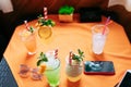 Five non  Alcoholic  summer Cocktail. Alcoholic beverage based on table with ice cubes and oranges Royalty Free Stock Photo