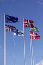 Five Nordic flags on flagpoles with EU flag. Denmark, Sweden, Norway, Finland, Iceland and European Union. Royalty Free Stock Photo