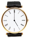 Five o'clock on dial of wristwatch isolated