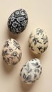 Five pastel eggs with black floral patterns, white background, text Royalty Free Stock Photo