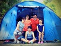 Five-person family with three children with camping tent