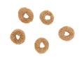 Five pieces of toasted oat breakfast cereal