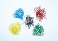 Five piles of coloured paper clips