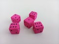 Five pink dice