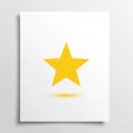 A five pointed yellow star is centered on a white rectangular background Royalty Free Stock Photo