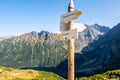 Mountain trail wooden directional sign in Tatra Mountains, pointing direction to Morskie Oko lake, Poland Royalty Free Stock Photo