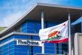 Five Prime Therapeutics logo at the biopharmaceutical company headquarters in Silicon Valley. Flag of California proudly waving -