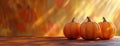 Five Pumpkins Resting On An Orange Surface Royalty Free Stock Photo