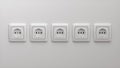 Five Realistic White Type F Socket on White Wall.