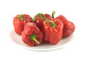 Five red bell peppers isolated close up Royalty Free Stock Photo