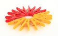 Five red and five yellow pegs situated around Royalty Free Stock Photo