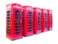 Five red telephone box in London isolated on white background with clipping path