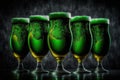 Splash of Refreshing five glasses of green beer Royalty Free Stock Photo