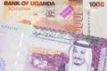 Ugandan currency paired with money from Saudi Arabia