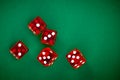 Five rolling red with white dots dices Royalty Free Stock Photo