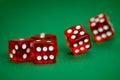 Five rolling red with white dots dices Royalty Free Stock Photo