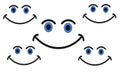 Five simple smiling faces with deep blue eyes against a white backdrop Royalty Free Stock Photo
