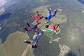 Five skydivers are in the sky. Royalty Free Stock Photo