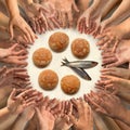 Five small barley loaves and two small fish for many hands