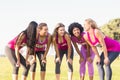 Five smiling runners supporting breast cancer marathon Royalty Free Stock Photo