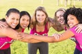 Five smiling runners supporting breast cancer marathon Royalty Free Stock Photo